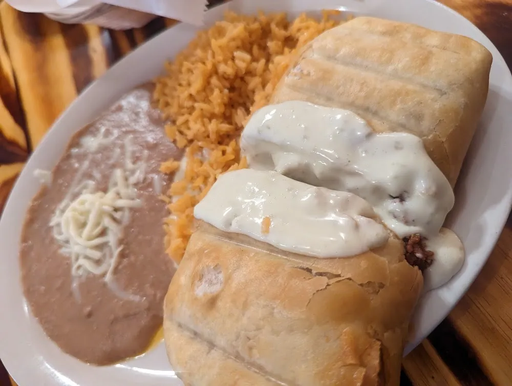 Tamal Con Arroz Y Frijoles Tamale with Rice & Beans